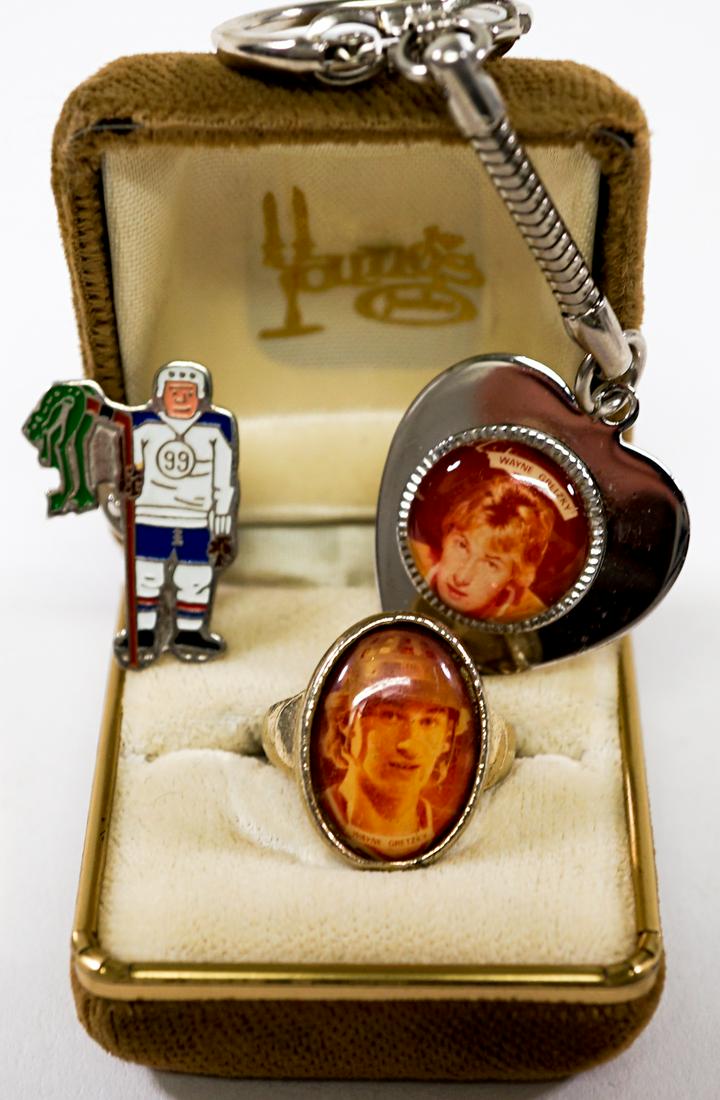 Wayne Gretzky RARE Early Ring, Keychain, Pin: Wayne Gretzky rare early metal ring, keychain and pin. They measure .75-in. to 1-in. Ring box is not original to the ring. It is just a box we had in our supplies to use to hold the ring. Provenance: