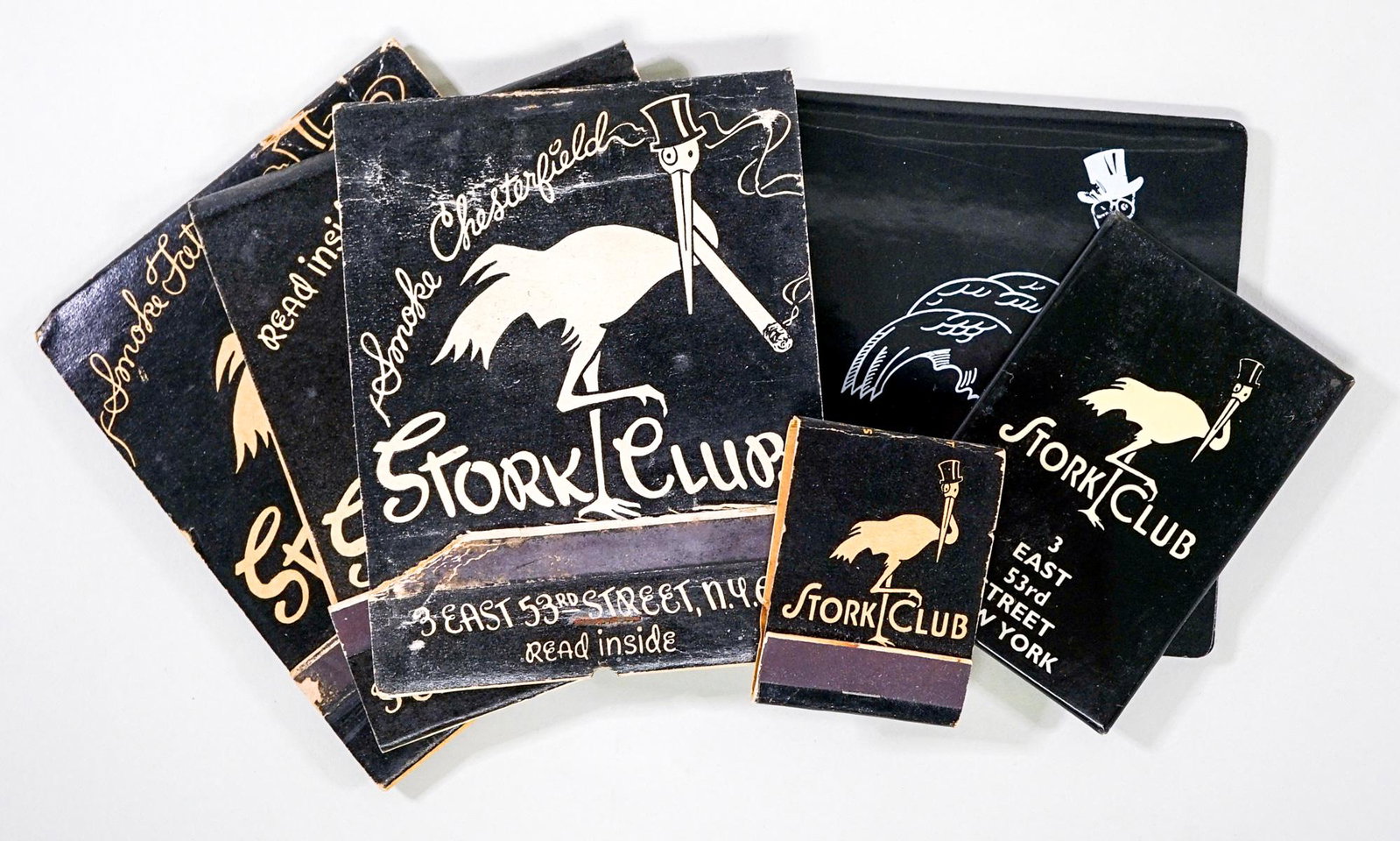 'Stork Club' Matches, Mirror and Coaster: 'Stork Club' Collection of four matchbooks; one mirror; and one coaster. The Stork Club was a famous nightclub in Manhattan from 1929-1965. Provenance: Gatz Hjortsberg (American Novelist) Collection, 