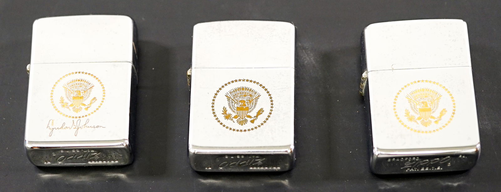 Lyndon B. Johnson (3) Vintage Lighters: Lyndon B. Johnson three vintage 'ZIPPO' lighters all with the Presidential Seal and all engraved 'Lyndon B. Johnson'. Each measures 2.25 in. x 1.5 in. Provenance: Estate of former United States of Ame