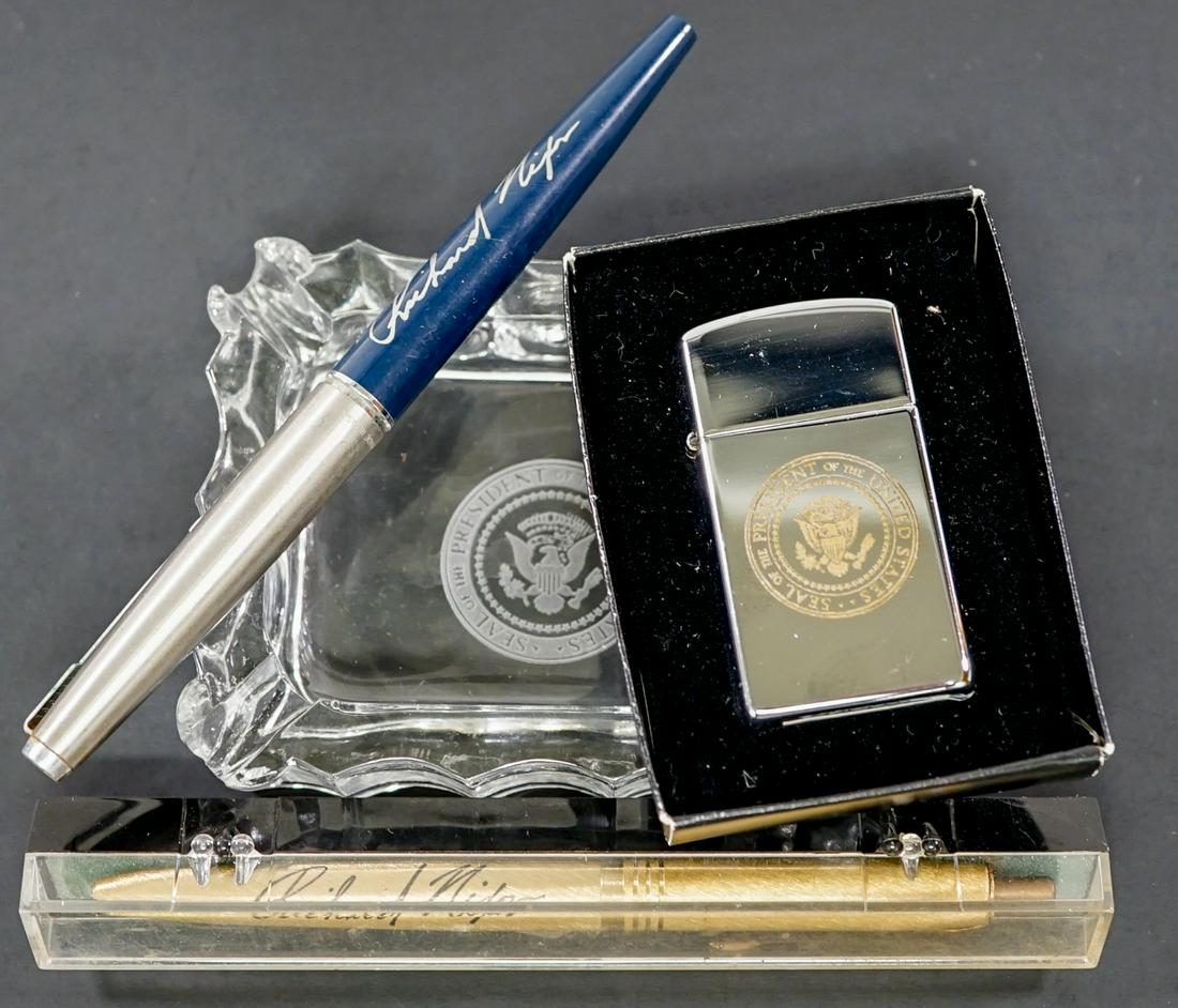 Vintage U. S. President Ashtray, Lighter and Pens: Presidential Seal vintage glass ashtray with one 'ZIPPO' lighter and two Richard Nixon inscribed pens. Provenance: Estate of former United States of America government employees, gifted while serving 