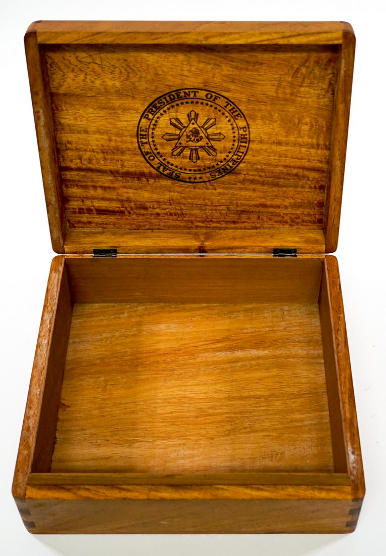 Seal of the President of the Philippines Box: Seal of the President of the Philippines wood cigar box. Seal on both inside and outside lid. Measures 8 in. x 9.25 in. x 3.5 in. Provenance: Estate of former United States of America government emplo