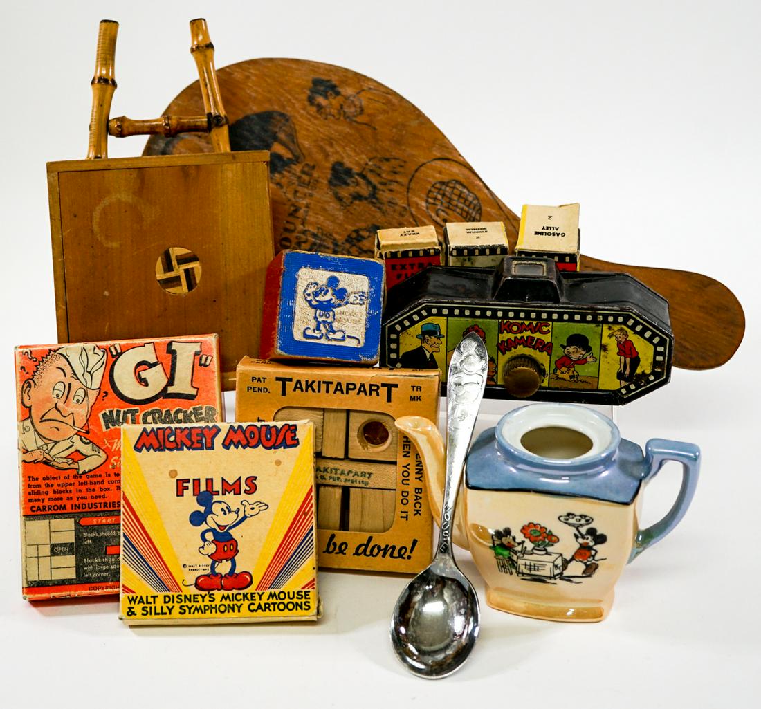 Vintage Disney Games and More (12): Collection of twelve vintage games. Includes: Disney 'Donald in Buzz Saw Battle' film; Komic Kamera with three rolls; GI Nutcracker; and more. Provenance: Gatz Hjortsberg (American Novelist) Collectio