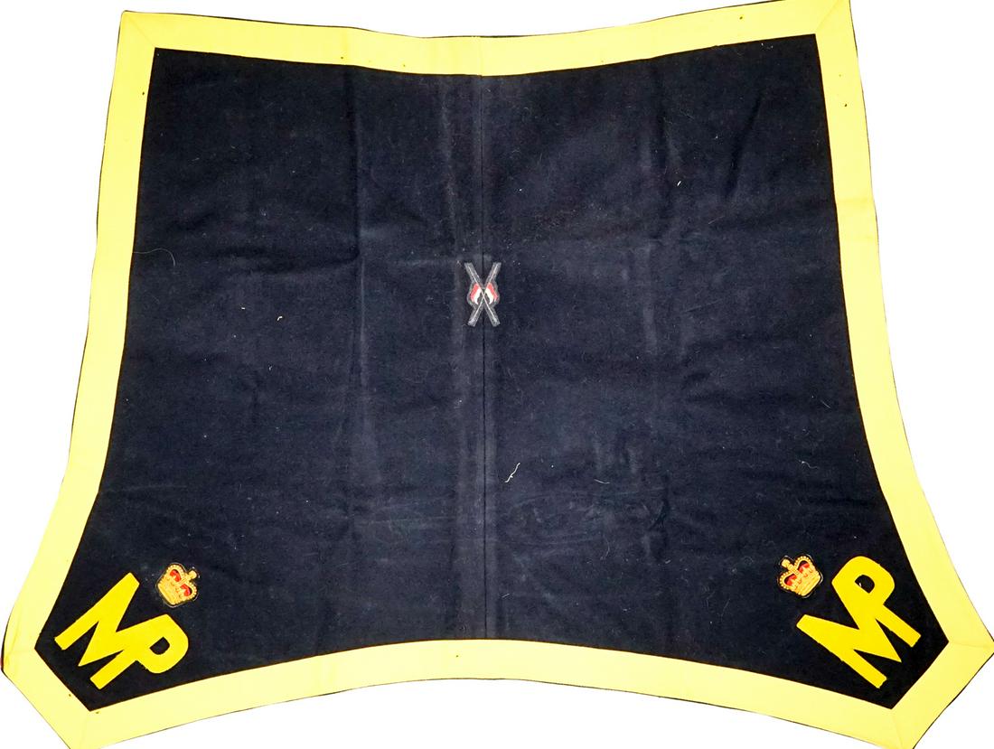 RCMP Canadian Mounted Police Saddle Blanket: RCMP Royal Canadian Mounted Police Saddle Blanket. Wool and cloth. Measures 44 in. x 35 in. at widest points. Several small holes on yellow cloth boarder. Small hole lower edge of backing. Some staini