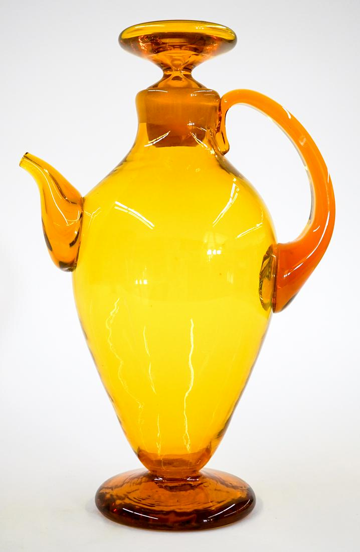 [Blenko] Mid-Century Pitcher with Spout: Blenko (or other maker) mid-century glass pitcher with spout. Measures at base 4 in. diameter and 7 in. wide with a total height of 11.5 in. No chips, cracks or repairs. Provenance: Tri-Cities, Washin