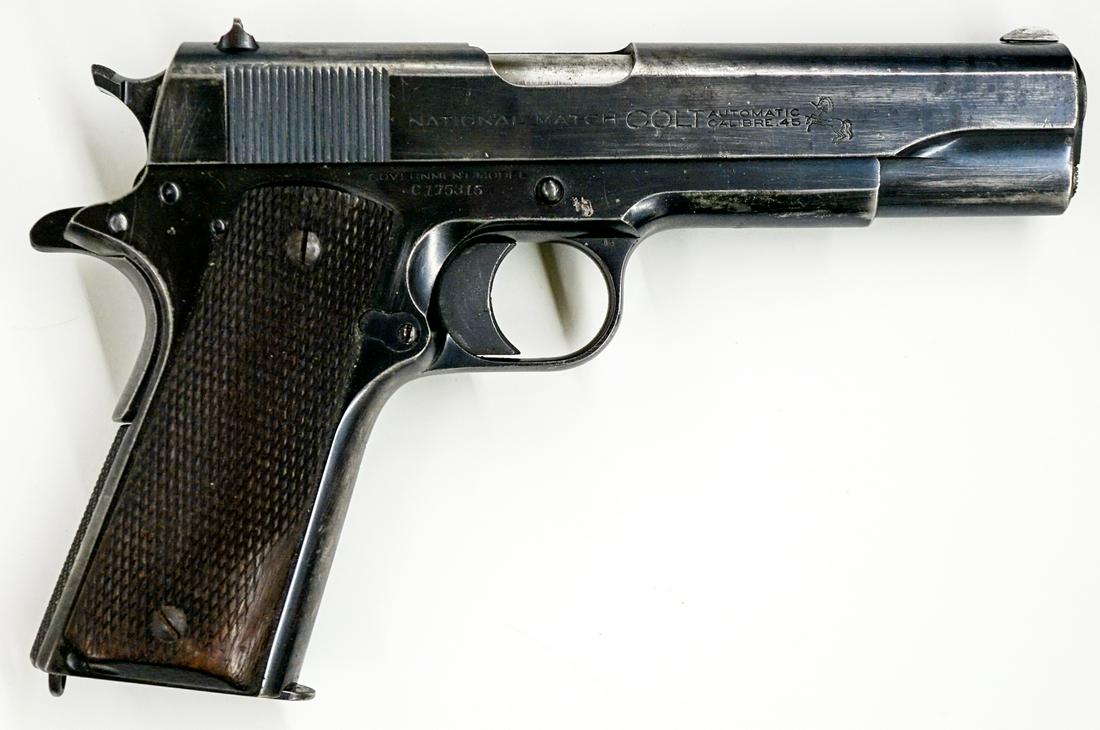 1934 Colt 1911 National Match .45: Serial number dates 1934, Colt National Match .45. Measures 8.5 inches in total length. Shows medium to heavy actual use, overall in good condition. Serial number C175315. Comes with seven magazines a