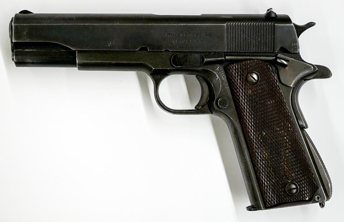 Ithaca Model 1911 A1 .45: 1911 Ithaca M 1911 A1 U.S. Army .45. Measures 8.5 inches in total length. Shows medium to heavy actual use, overall in good condition. Serial number 2427534. Comes with one magazine and leather holste