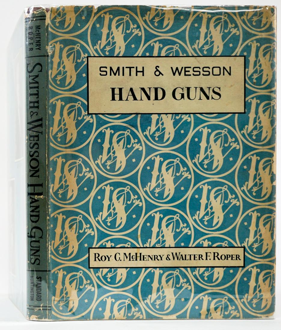 Smith and Wesson Hand Guns 1945: Smith and Wesson Hand Guns by Roy G. McHenry and Walter F. Roper. 1945 with dust jacket unclipped. Standard Publications. 233 pp. Illustrated. Cloth covers with gilt lettering. Measures 10.75 in. x 8