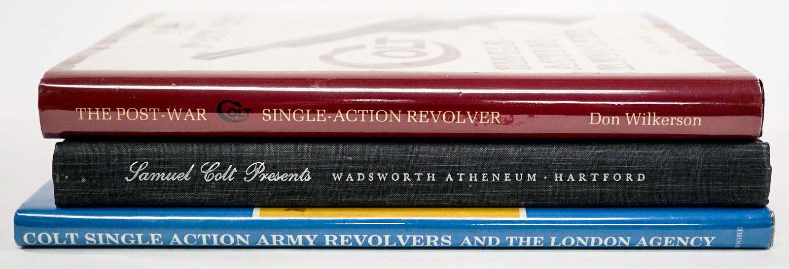 Colt Firearms (3) Books (One Signed): Collection of three Colt Firearm books. Includes: 1) The Post-War Colt Single-Action Revolver by Don Wilkerson. 1980 second edition author signed on title page. 2) Samuel Colt Presents American Societ