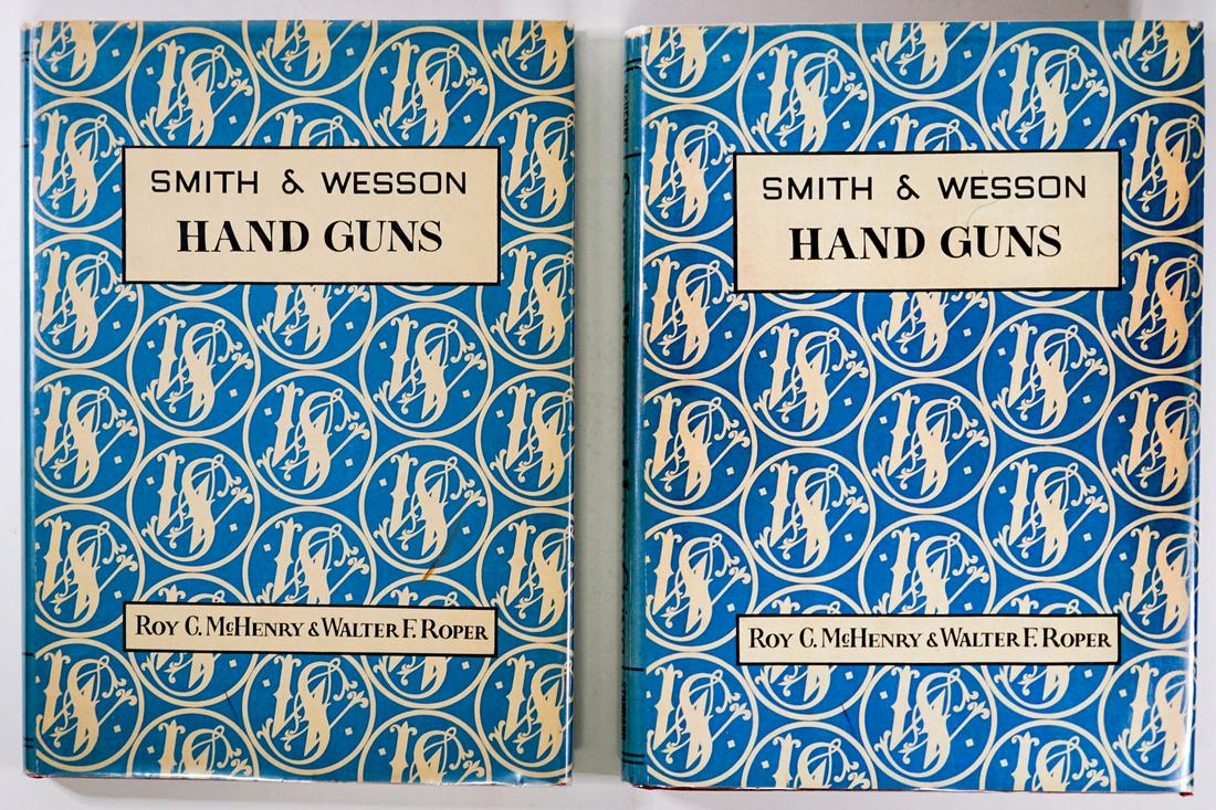 Smith and Wesson Hand Guns 1945, 1947 (2) Books: Two editions of Smith and Wesson Hand Guns by Roy C. McHenry and Walter F. Roper. 1945 and 1947 editions. Standard Publications. 233 pp. each. Illustrated. Red cloth with gilt lettering and design. Ea