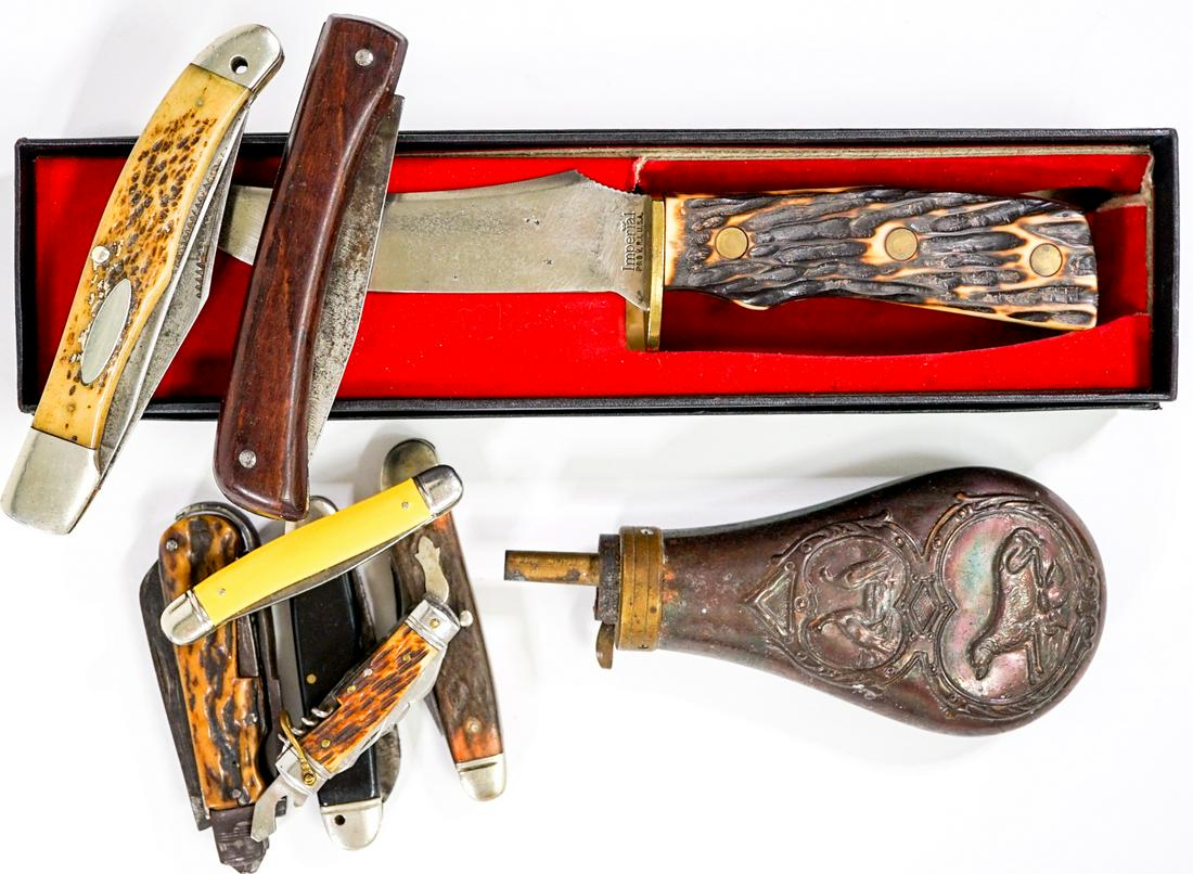 Vintage Hunting and Pocket Knives; Powder Flask: Collection of eight vintage hunting and pocket knives, includes one Challenge Cutlery pocket knife; and one powder flask. The hunting knife with 5 inch blade and 4.5 in. handle; pocket knives measure