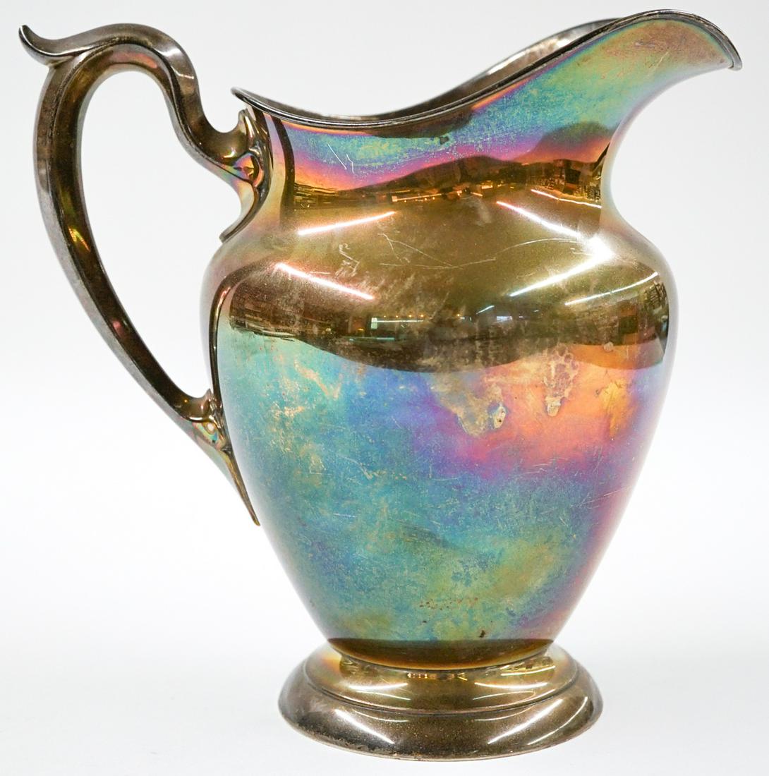 Gorham Sterling Silver Water Pitcher: Gorham sterling silver water pitcher. Measures 8-in. x 8.75-in. Weighs 20 troy ounces. Very good to excellent condition with no monograms. If lot is absent of a condition report one may be requested v