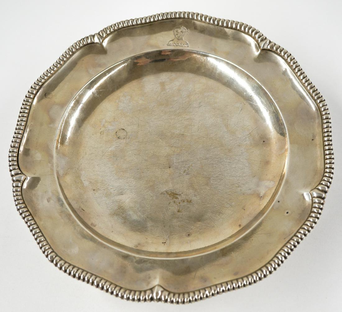 David Whyte George III Silver Plate: A George III London sterling plate attributed to David Whyte. Marked with an italicized "DW". Date stamp for 1768. Measures 9.25-in. tall. Weighs 438 grams. Good condition. If lot is absent of a condi