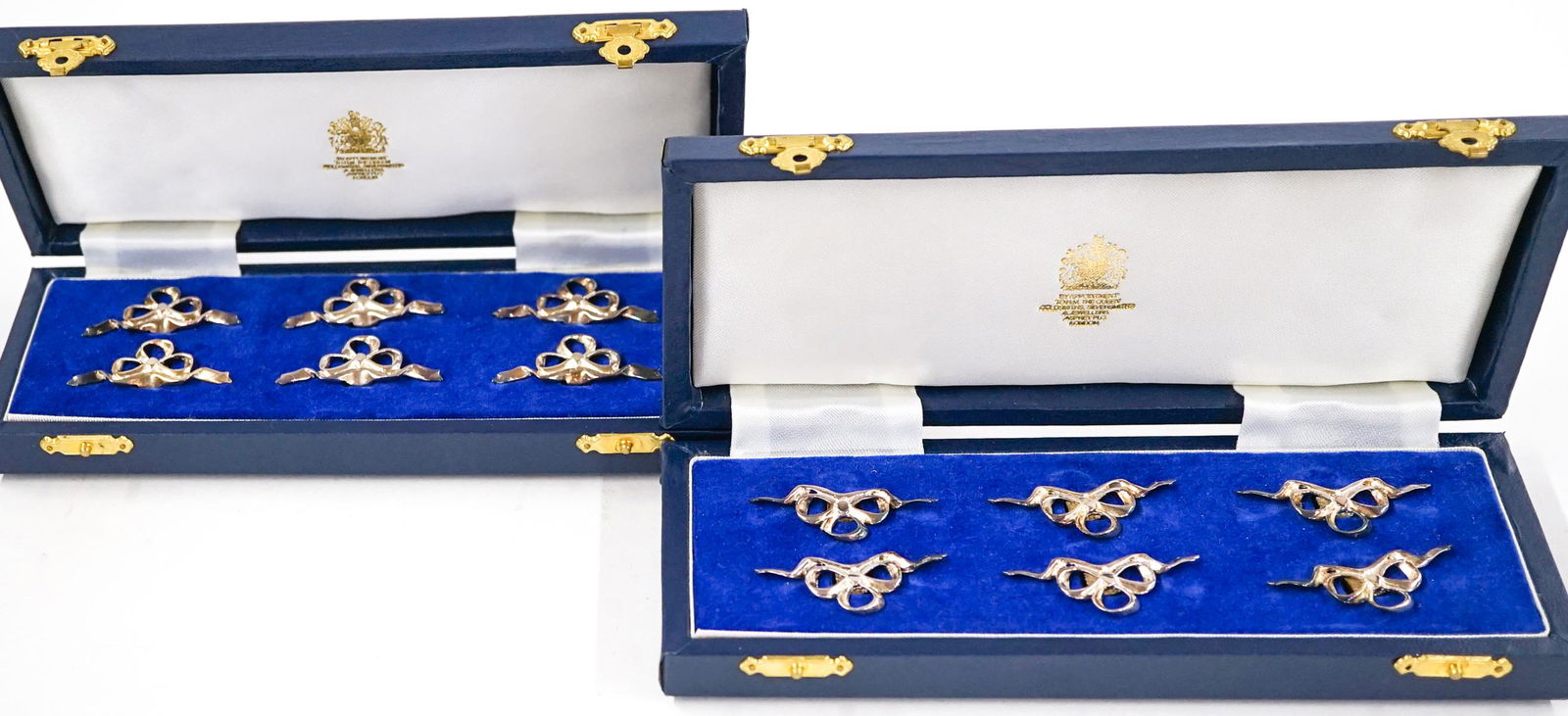 Asprey Birmingham Sterling Place Card Holders: Asprey Birmingham sterling place card holders, set of 12. They measure 1.5-in. x .75-in. They are mint in box. They weigh 96 grams total. If lot is absent of a condition report one may be requested vi