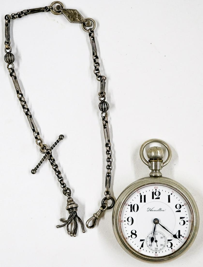 Hamilton Pocket Watch Grade 936 17 Jewels: Hamilton pocket watch grade 936 17 jewels, size 18. Excellent condition. Includes metal (no silver content detected) fob. If lot is absent of a condition report one may be requested via email. Conditi
