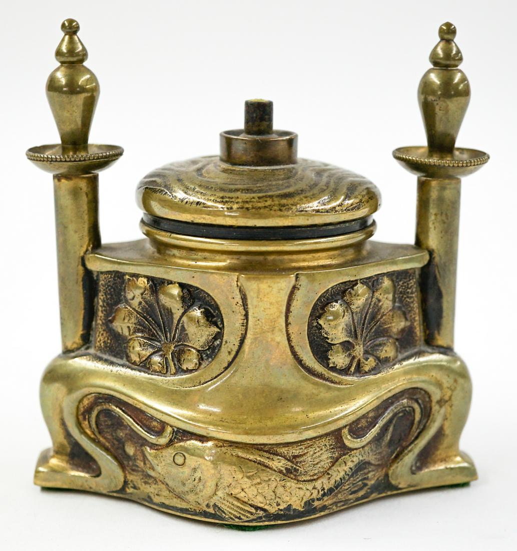 Art Nouveau Bronze Oil Lamp: An antique Art Nouveau bronze oil lamp. Measures 4-in. x 3.5-in. x 2-in. Very good condition. If lot is absent of a condition report one may be requested via email. Condition report is provided as an 