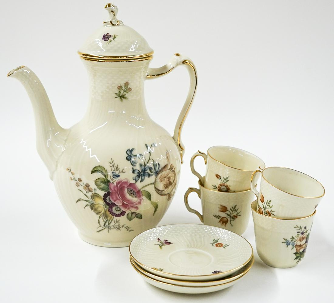 Royal Copenhagen Frijsenborg Pattern: Royal Copenhagen Teapot with four cups and three saucers. Teapot measures 10.25-in. No damage. An antique silver or nickel plate traveling candle lamp. Measures 6-in. x 2.75-in. x 1.75-in. Very good c