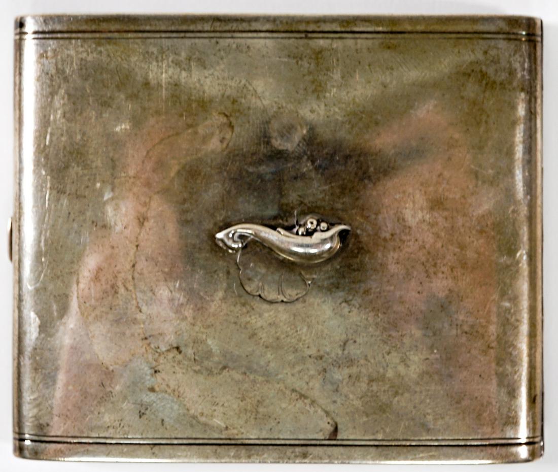 Georg Jensen Denmark Sterling Cigarette Case: Georg Jensen Denmark sterling silver cigarette case. Made in Denmark with Jensen monogram. Measures 3.125-in. x 3.75-in. x .5-in. and weighs 133 grams. If lot is absent of a condition report one may b
