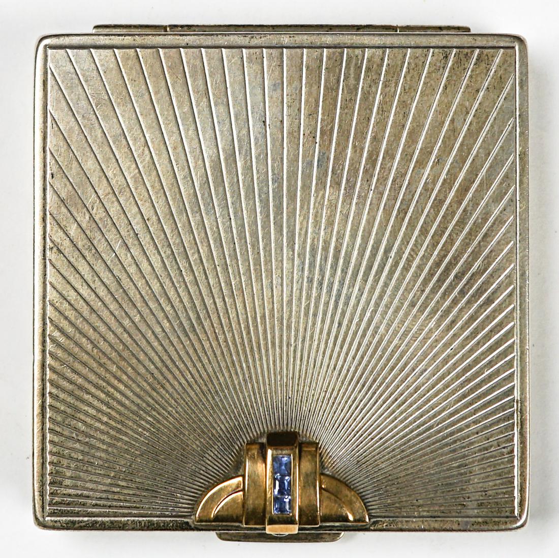 Cartier Sterling and 14k Compact: Cartier sterling and 14k compact. Measures 2.25-in. x 2.375-in. Weighs 85 grams. Very good to excellent condition. If lot is absent of a condition report one may be requested via email. Condition repo