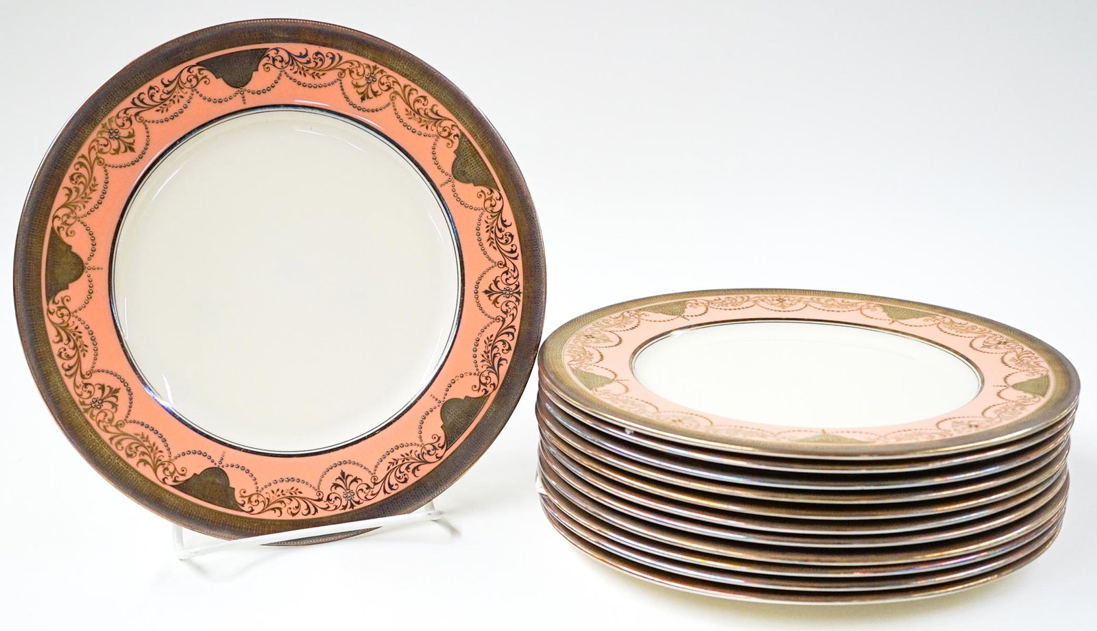 Lenox Fine Silver Rimmed Dinner Plates (12): A set of twelve Lenox fine china silver-rimmed dinner plates. They measure 10.25-in. in diameter. EX+/NrMt condition with light use if any. Free of any knife scratches or evidence of actual use. If lo