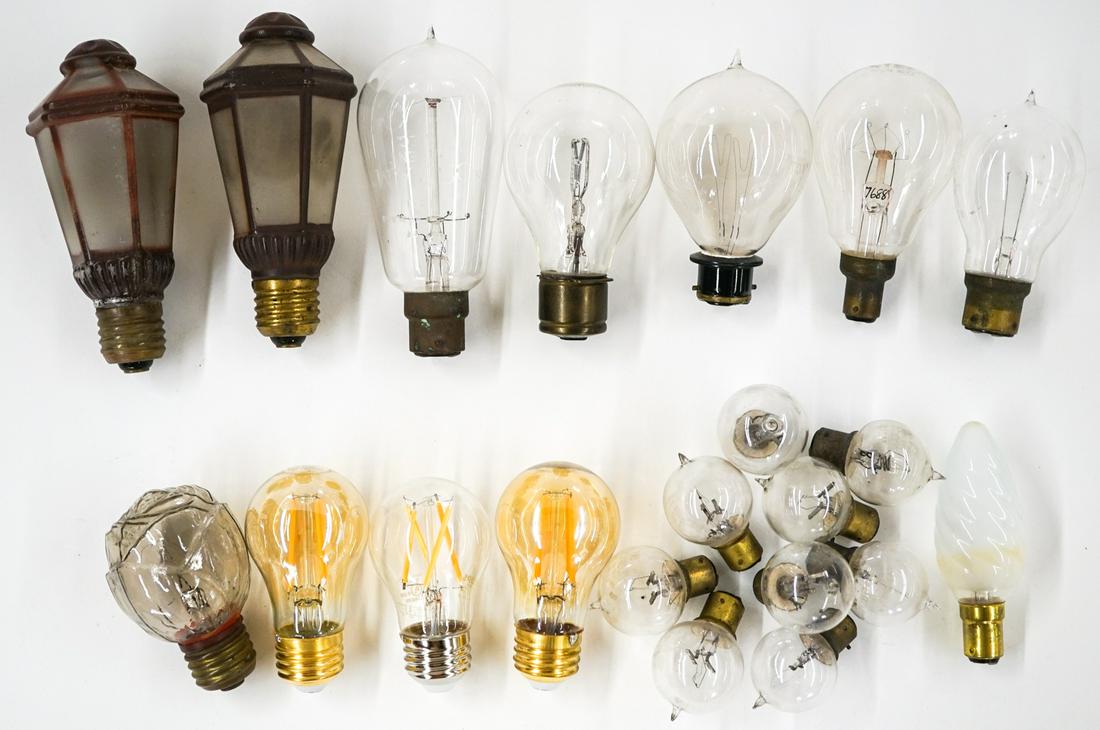 Vintage Light Bulbs and Parts (20): Collection of twenty light bulbs and fixture parts. Most appear vintage or antique. Several appear to be newer. Various sizes. None have been tested. If lot is absent of a condition report one may be 