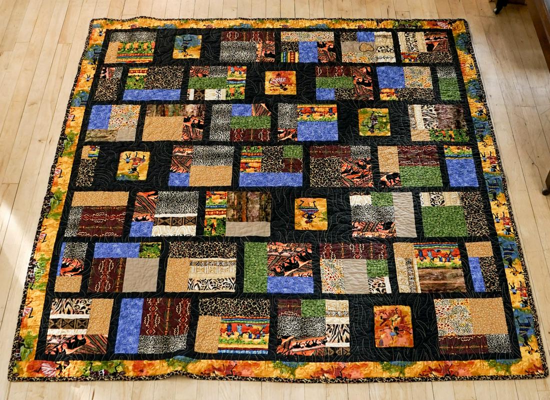 Aboriginal Quilt: An Aboriginal quilt. Measures 67.5-in. x 59-in. Very good condition. If lot is absent of a condition report one may be requested via email. Condition report is provided as an opinion only and is no gu