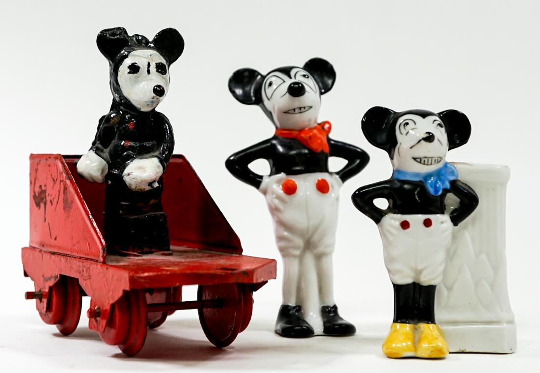 Mickey Mouse Vintage Collectibles (3): Mickey Mouse vintage collectibles. Includes a porcelain bud vase or pencil holder (3-in.), porcelain standing figure (3.5-in.) and a Lionel train car (as-is). If lot is absent of a condition report on