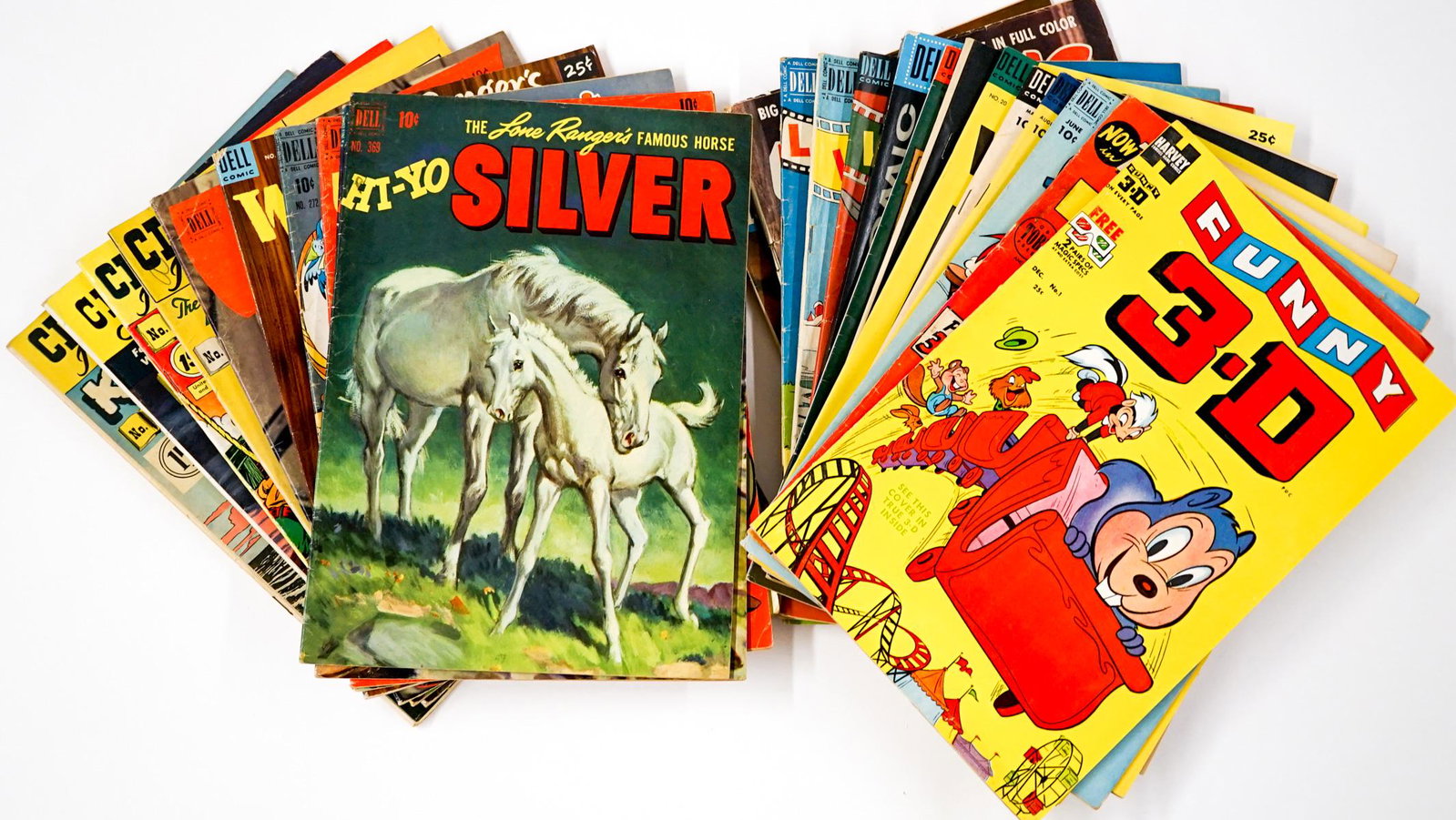 1950's Estate Comic Book Lot (24): An estate lot of 1950's comics. Walter Lantz Woody Woodpecker, Harvey Funny 3D (no 3D glasses), Hi-Yo Silver and more. Condition varies. If lot is absent of a condition report one may be requested via