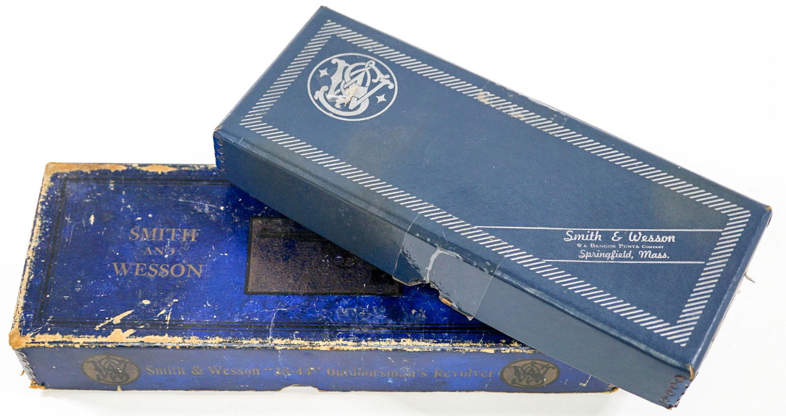 Smith & Wesson Boxes-Boxes Only (2): Two Smith & Wesson boxes, boxes only. If lot is absent of a condition report one may be requested via email. Condition report is provided as an opinion only and is no guarantee as grading can be subje