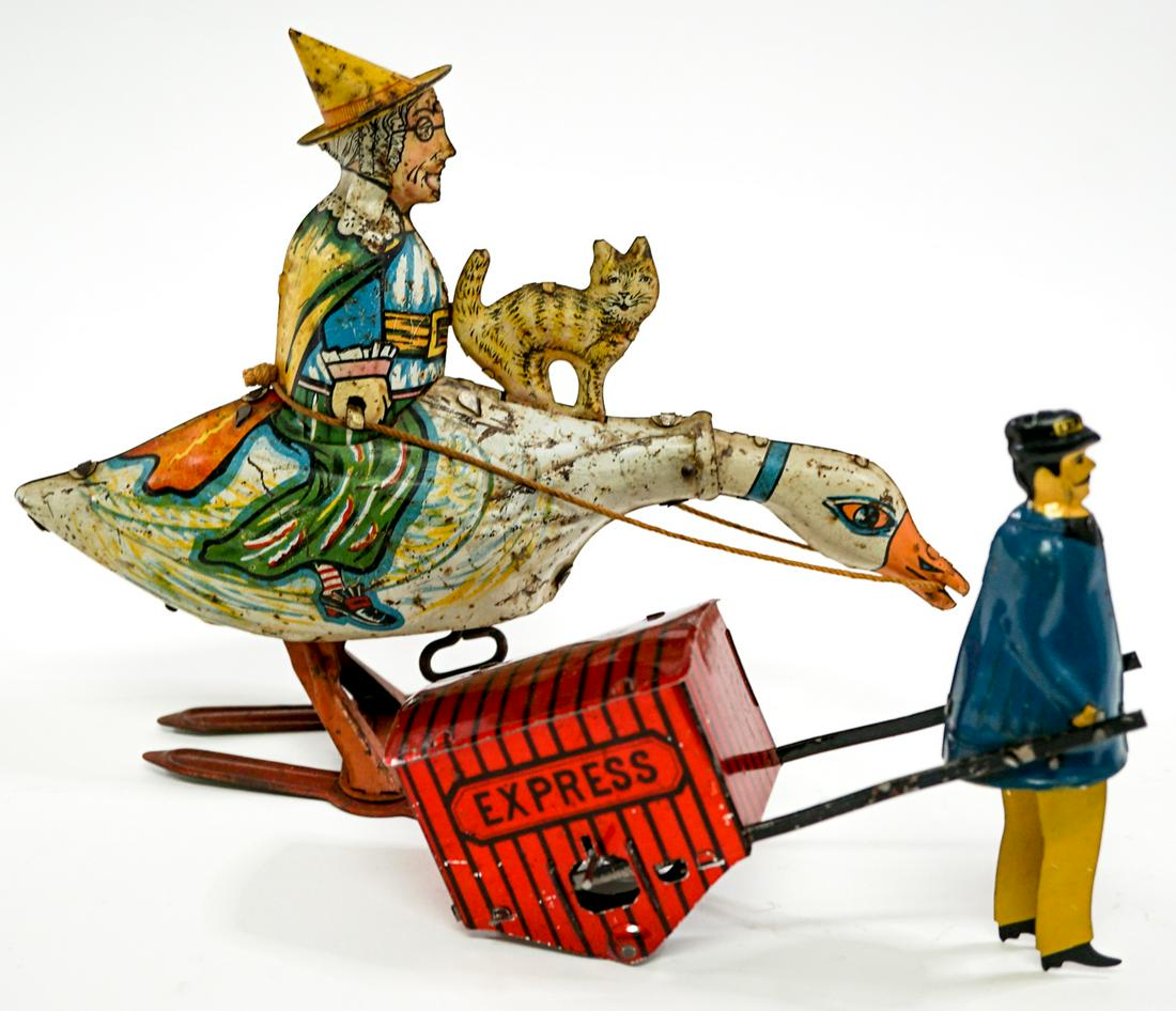 Mother Goose and Partial Lehman Toy: Mother Goose wind-up toy. Tested. Also in this lot is a partial Lehman Express toy (missing wheels and possible other parts). Measures 6 in. - 9 in. x 5 in. - 7.5 in. tall. If lot is absent of a condi