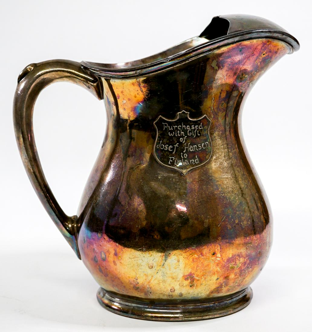 Silver-Plate Water Pitcher 1909 Seattle [AYP]: Antique silver-plate water pitcher by International Silver Co. The 'Seal of the City of Seattle 1909' (AYP) on one side and 'Purchased with Gift of Josef Hansen to Firland' on the other. Measures 10.5