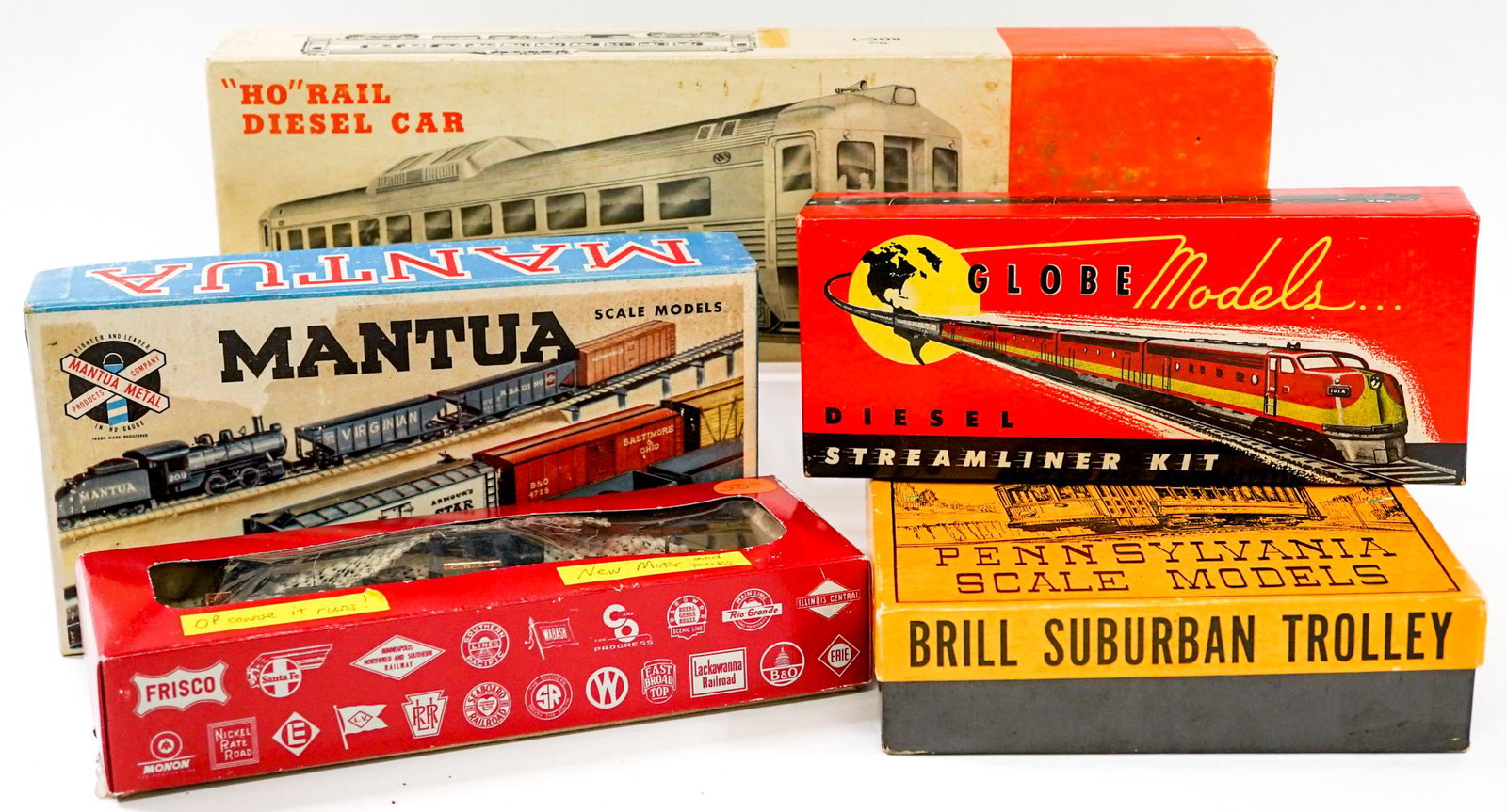 Toy Model Kits and Train (5): Collection of five vintage toy model kits and train. Include: Brill Suburban Trolley; Mantua; C B and O train and more. Boxes measure 6.25 in. - 13 in. wide. If lot is absent of a condition report one