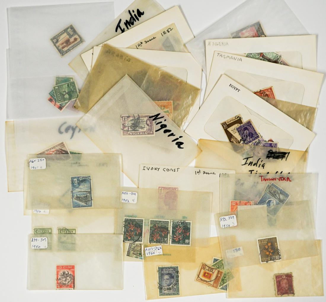 India, Arabia, Persian, Egypt, Ceylon Stamps: A group of antique and vintage loose stamps from India, Saudi Arabia, Egypt, Ceylon and more. Provenance: Richard Hunt collection, Montana state. If lot is absent of a condition report one may be requ