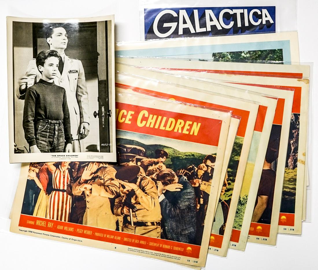 The Space Children (7) Lobby Cards and More: Nine lobby cards and one photo of 'space invasions'. Include: The Space Children starring Michael Ray. 1958 Paramount Pictures (7 cards); The Day Mars Invaded Earth (1 card); cards measure 11 in. x 14