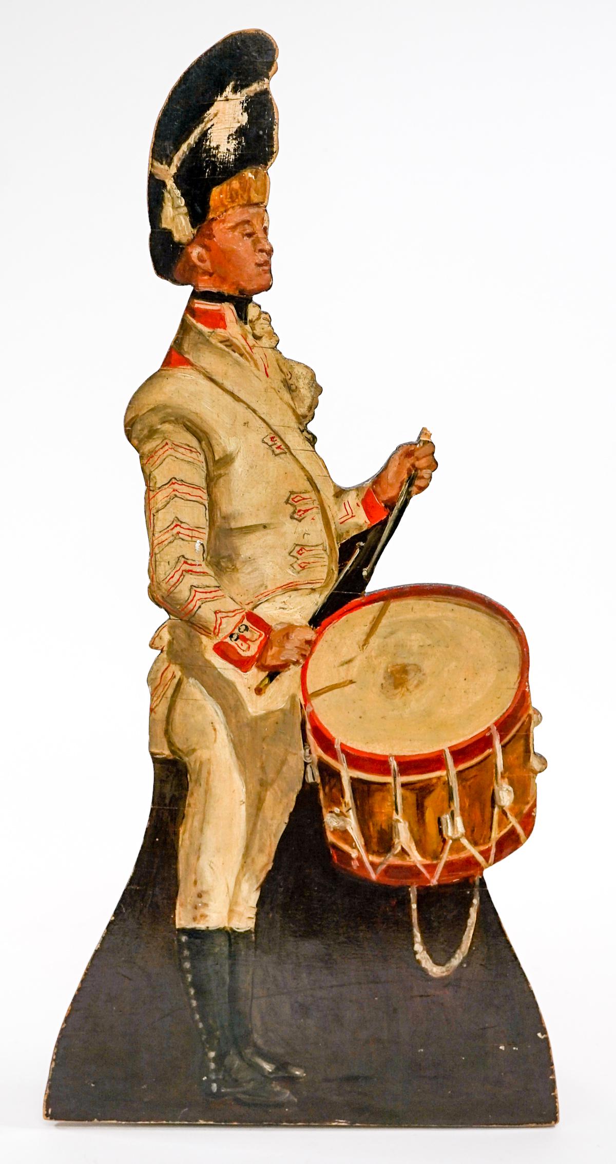 'Drummer' Door Stop 1815 [33rd Regiment]: Drummer Boy Door Stop 1815, 33rd Regiment. Created 20th century depicting circa 1815 drummer. Measures 18 in. tall x 9 in. wide x 3.125 deep. Weighs 6 lbs. Provenance: From the estate of Clint Max Mil