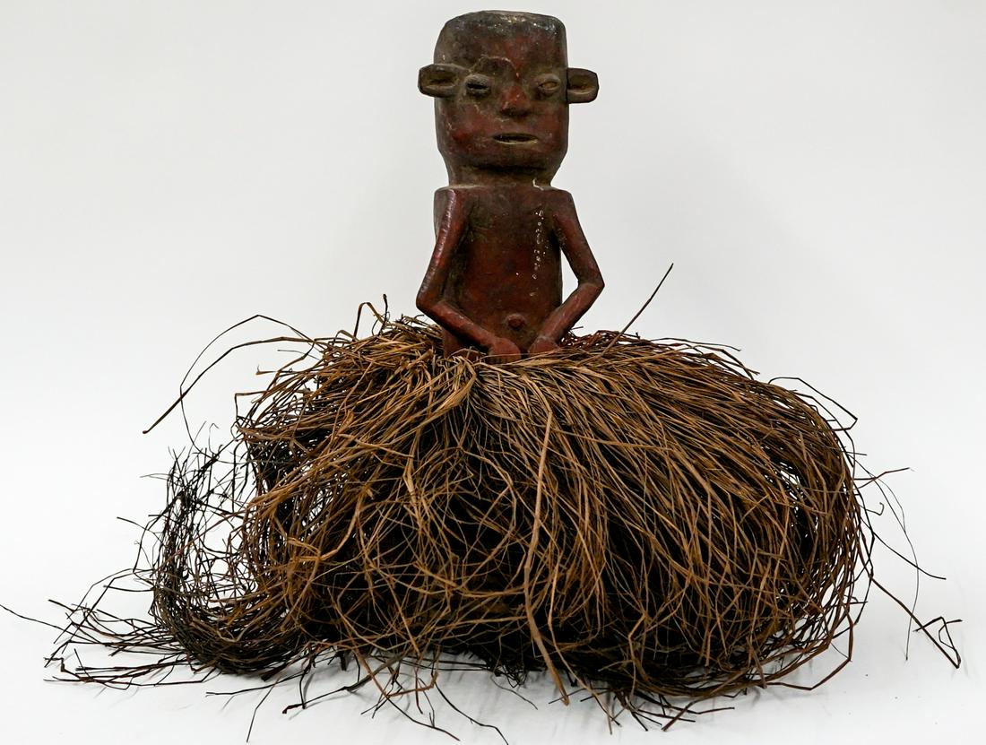 Ethnic Carving with Grass Skirt (1 of 4)