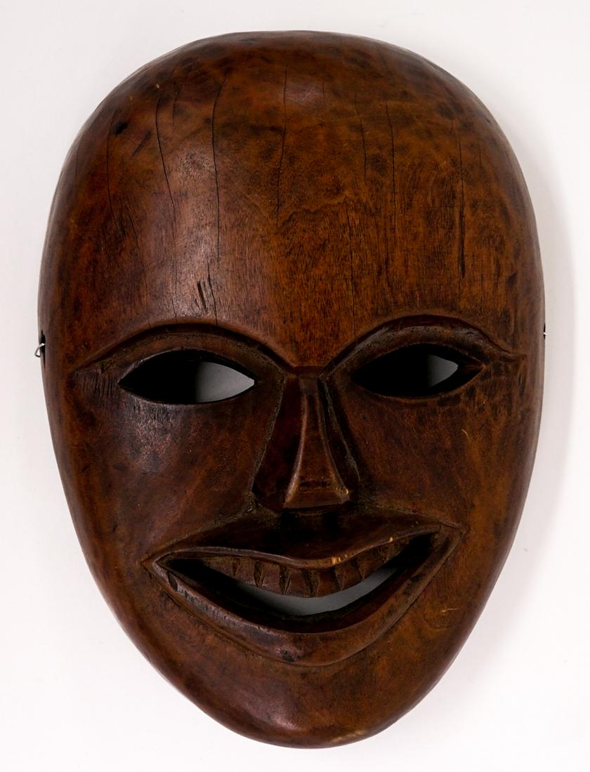 Vintage Carved Wood Mask: Vintage carved wood mask. Measures approximately 12 in. x 8 in. x 3 in. Weighs approximately 3 lbs. If lot is absent of a condition report one may be requested via email. Condition report is provided 