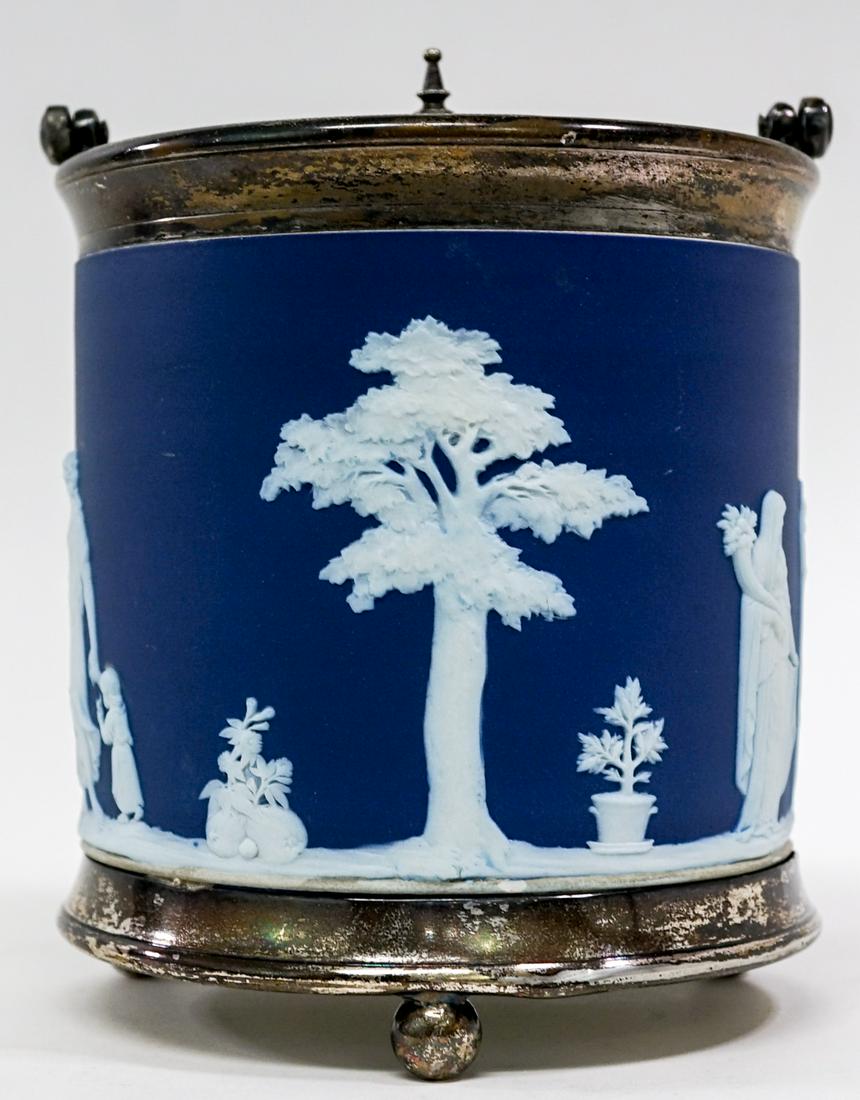 Wedgwood 19th C. Blue Dip Biscuit Barrel: Wedgwood England 19th century blue dip biscuit barrel. Measures 6.5 in. tall x 5.5 in wide. Weighs 3 lbs. If lot is absent of a condition report one may be requested via email. Condition report is pro