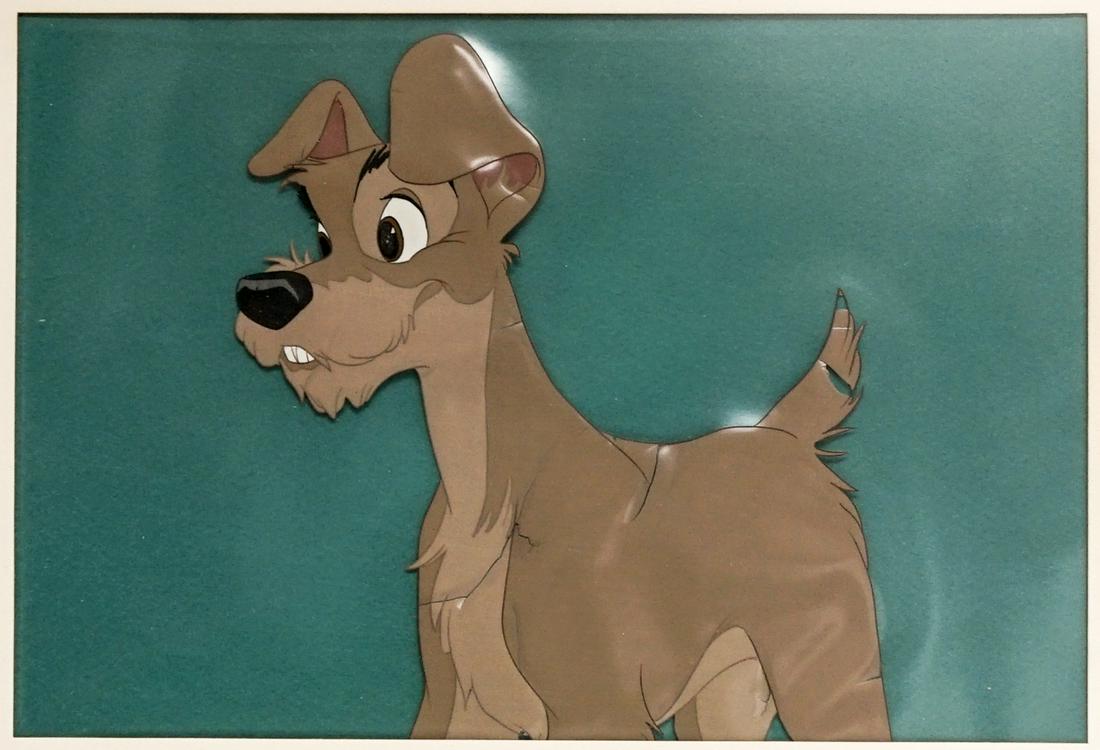 Lady and the Tramp Original Production Cel: Lady and the Tramp original production cel. Measures 7.375-in. x 10.875-in. sight size, 12.75-in. x 15.25-in. framed. There are some splits on chest. If lot is absent of a condition report one may be