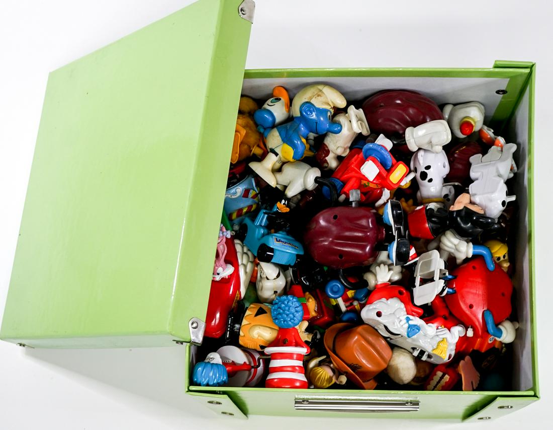 Small Wind-Up (75) Toys: Collection of over seventy-five (75) wind-up, friction, action figures and more. Measures up to approximately 5 in. tall. Group measures 11 in. x 11 in. x 8 in. If lot is absent of a condition report