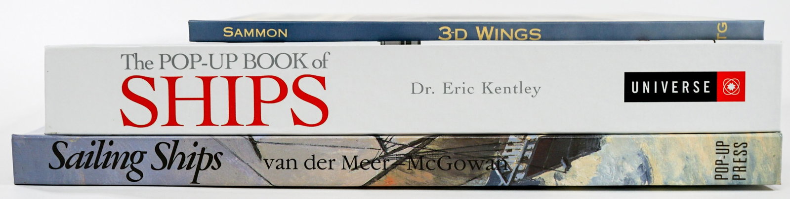 Ships and Airplanes (3) Pop-Ups and 3D Books: Three (3) pop-up and 3D books. Includes: 3D Wings by Rick Sammon; Ships by Hawcock; and Sailing Ships by McGowan. Group measures 12.5 in. x 12 in. x 2.75 in. Provenance: William Emery Collection, Sher