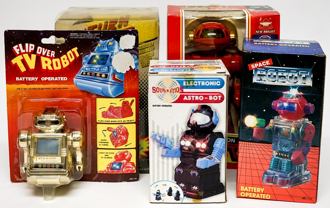 Group of Toy Robots: A group of toy robots (5). In boxes and on card, untested. If lot is absent of a condition report one may be requested via email. Condition report is provided as an opinion only and is no guarantee as