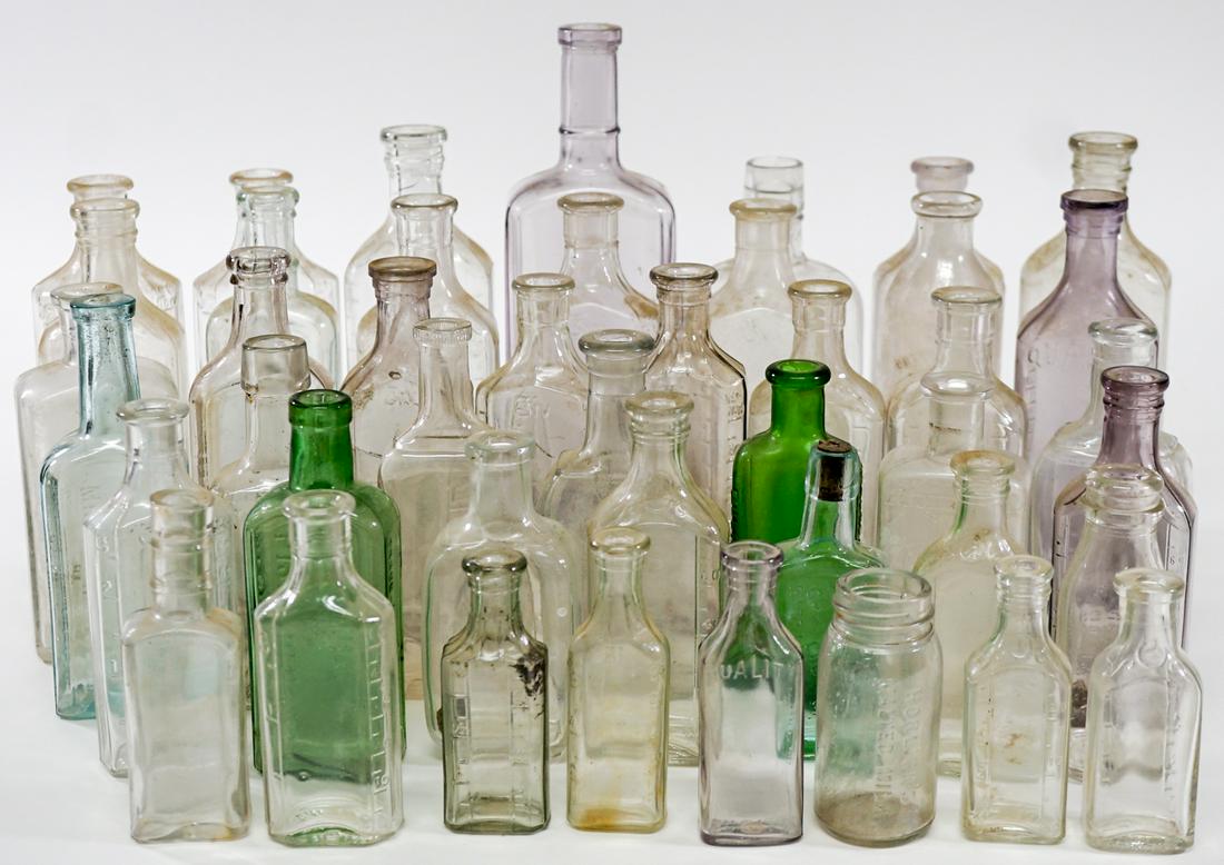 Antique and Vintage (40) Bottles [Medicine]: Over forty (40) antique and vintage bottles. Includes Lancert Wine Co., Spokane WA bottle and more. Group measures 13 in. x 12 in. x 9 in. Weighs approximately 10 lbs. If lot is absent of a condition 
