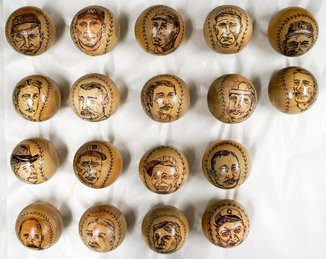 Hall of Famers Pyrographic Baseballs (18): A collection of (18) pyrographic wood baseballs of past Hall of Famers. This lot includes Buck Ewing, Charles Comiskey, A.G. Spalding, John Ward, Walter Johnson, Jim Bottomley and more. Baseballs are