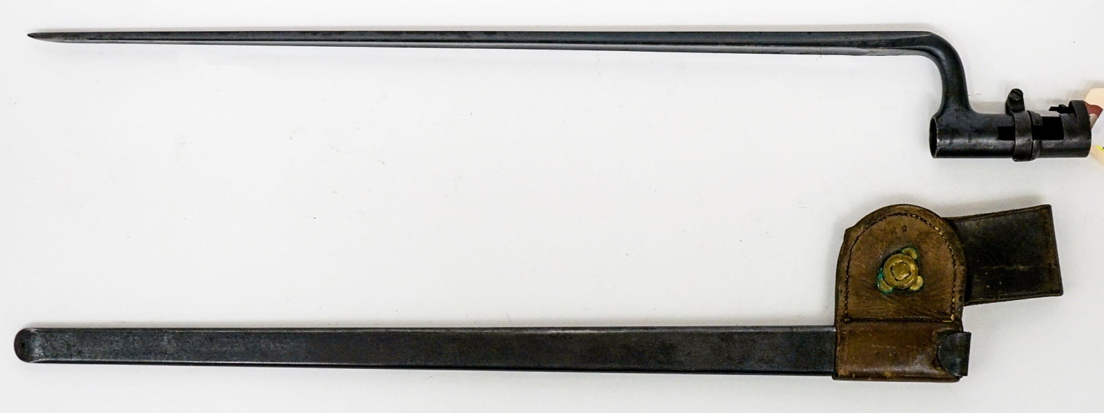 U.S. Springfield Bayonet and Scabbard: U.S. bayonet and scabbard. Measures 22-in. If lot is absent of a condition report one may be requested via email. Condition report is provided as an opinion only and is no guarantee as grading can be 