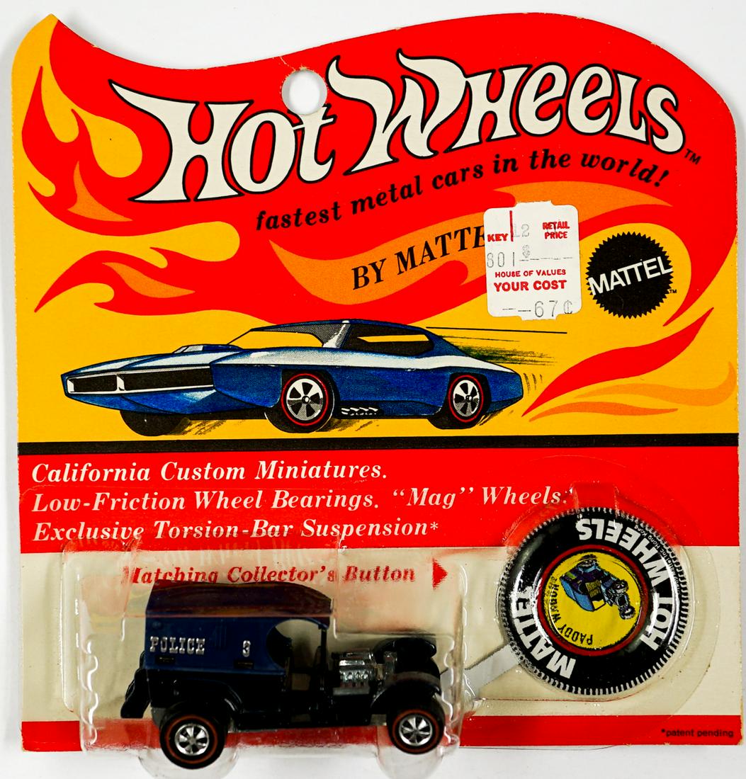 Hot Wheels Redline Paddy Wagon on Blister: Hot Wheels Redline Pady Wagon (Dark Blue exterior, Brown interior, Silver Police and 3 on sides, 1970) on Blister Card. Just found boxed after 50+ years of safe covered box storage. Car is mint with z