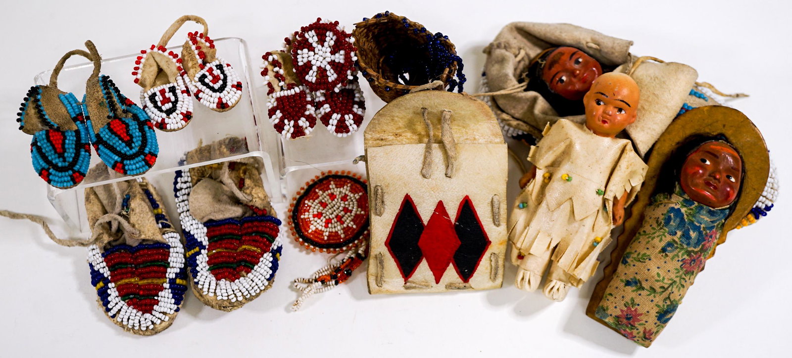 Group of Native American Miniatures: Group of Native American Miniatures. If lot is absent of a condition report one may be requested via email. With old repairs, in as found condition. Condition report is provided as an opinion only and