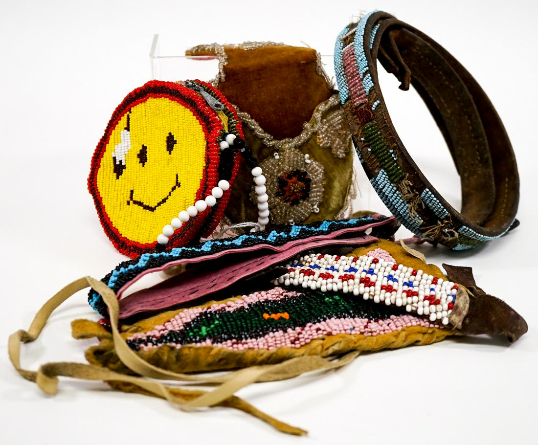 Group of Beaded Items: Group of beaded items with belt, knife and more. If lot is absent of a condition report one may be requested via email. With old repairs, in as found condition. Condition report is provided as an opin