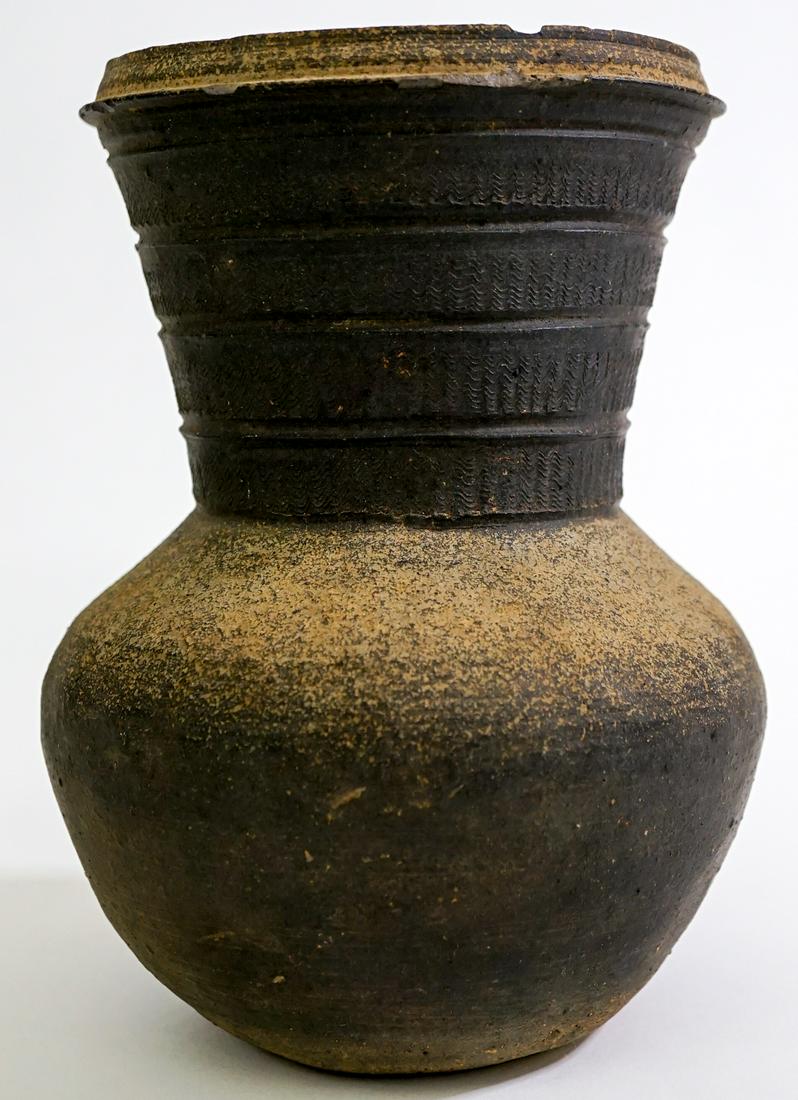 Korean Antique Silla Pottery Vase: Korean Antique Silla Pottery Vase. Measures 8.25-in. x 5.75-in. Two chips on top rim. Gifted to previous owners forty plus years ago by Korean antiques dealer Sun Weitz.. If lot is absent of a conditi