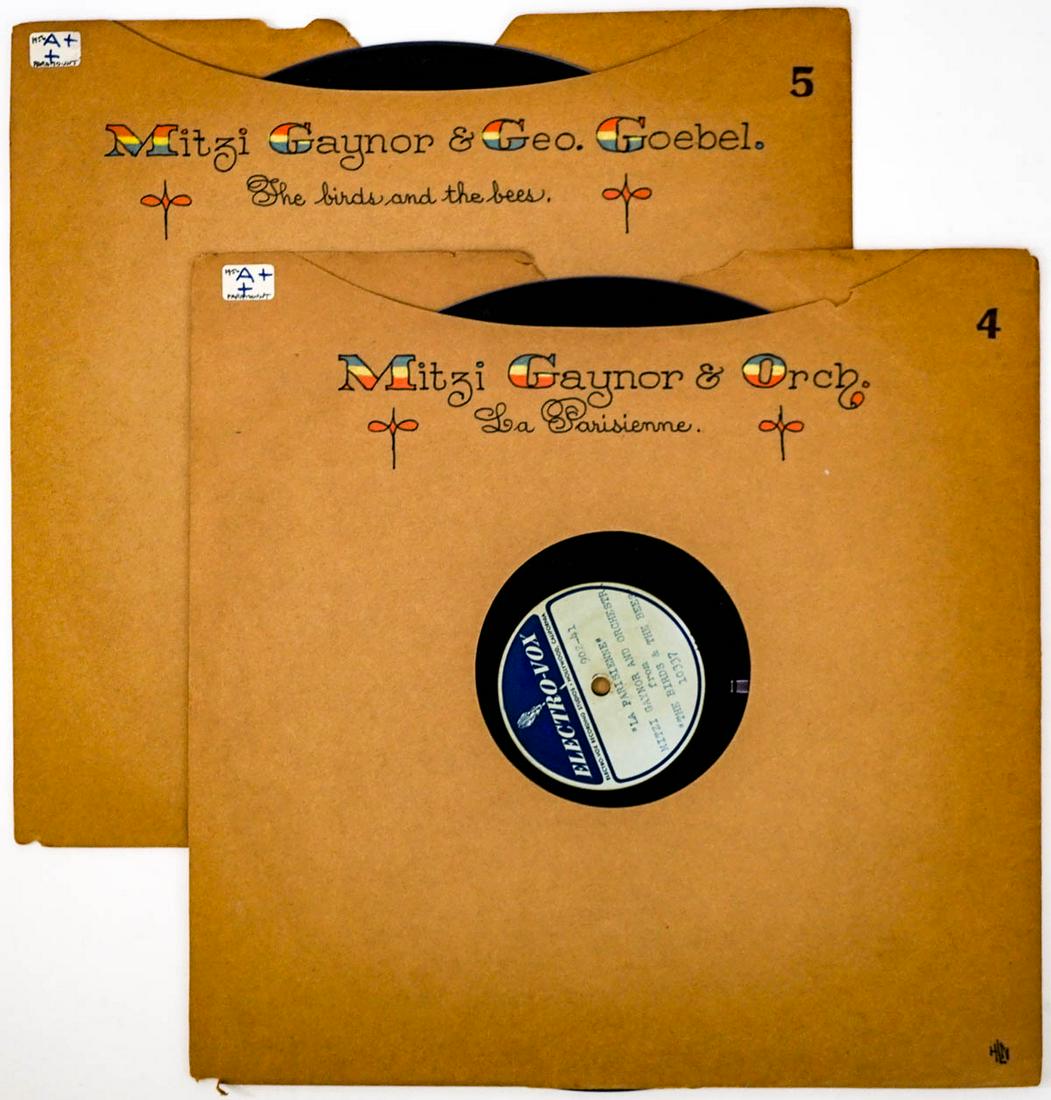 Mitzi Gaynor and Geo. Goebel (2) Production Discs: Two (2) Mitzi Gaynor and George Goebel 12 inch production discs. 'The Birds and the Bees' and 'The Parisienne'. Provenance: William Emery Collection, Sheridan Wyoming. If lot is absent of a condition