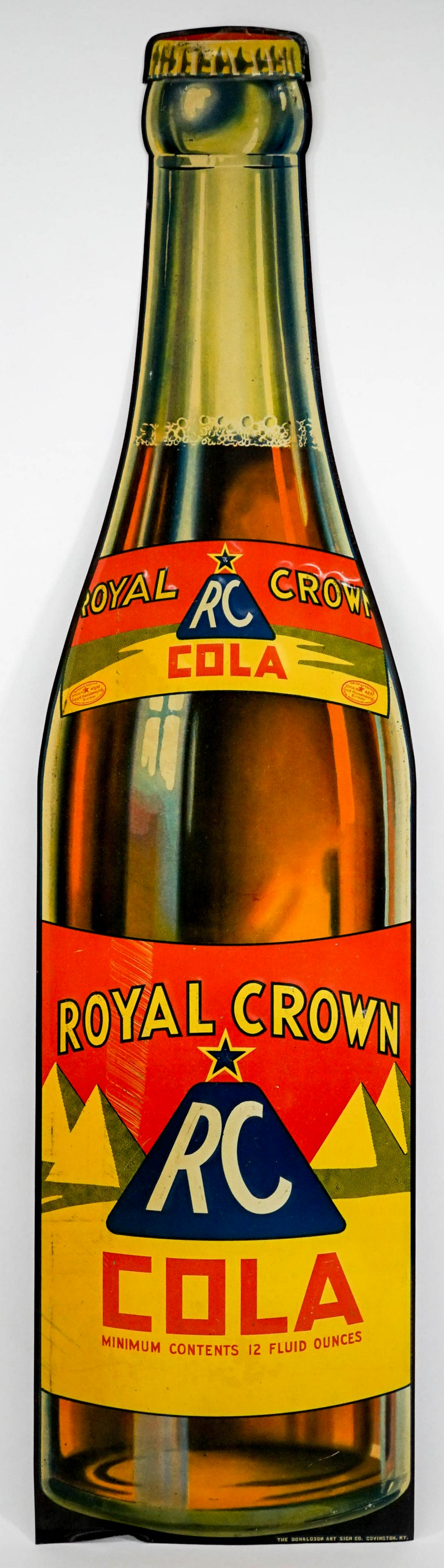RC Royal Crown Cola Large Vintage Tin Litho Sign: RC Royal Crown Cola Large Vintage Tin Litho Sign. Measures 30-in. x 8-in. EX. If lot is absent of a condition report one may be requested via email. Condition report is provided as an opinion only and